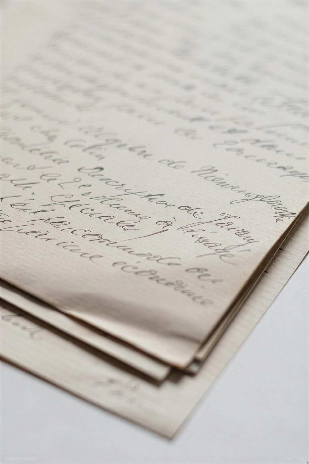The same handwritten pages enlarged 2x with the image enhancer, ink strokes and paper fibres sharper