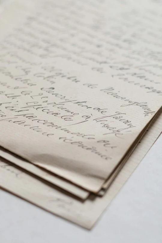 The same handwritten pages at 540×810 before upscaling, soft ink strokes