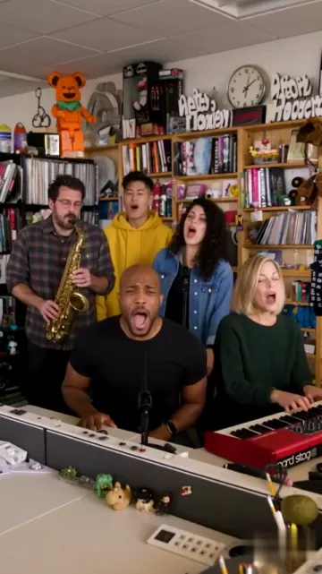 The band in the Tiny Desk AI video sample made from five photos: all five members behind the desk